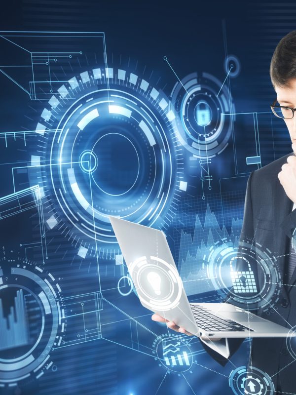 Businessman hands using device with digital business interface. Innovation and media concept. Double exposure